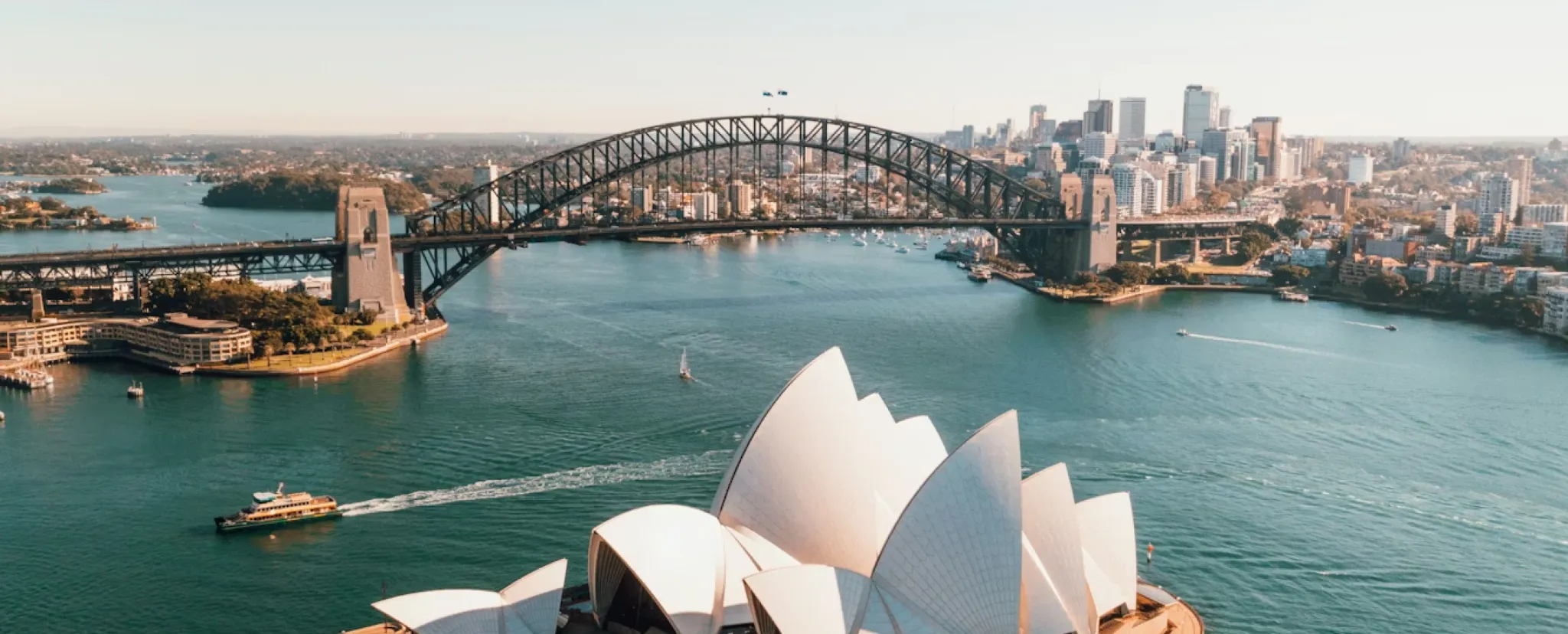 Aerial view of Sydney Harbour with the Opera House and Harbour Bridge