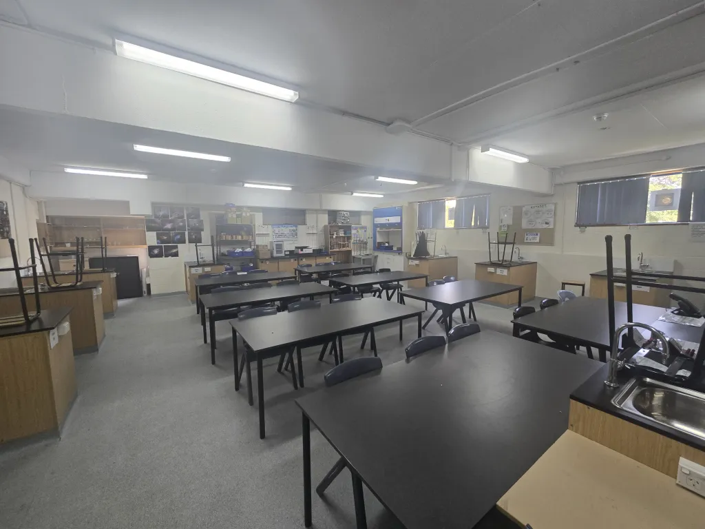 School science laboratory with black-topped benches