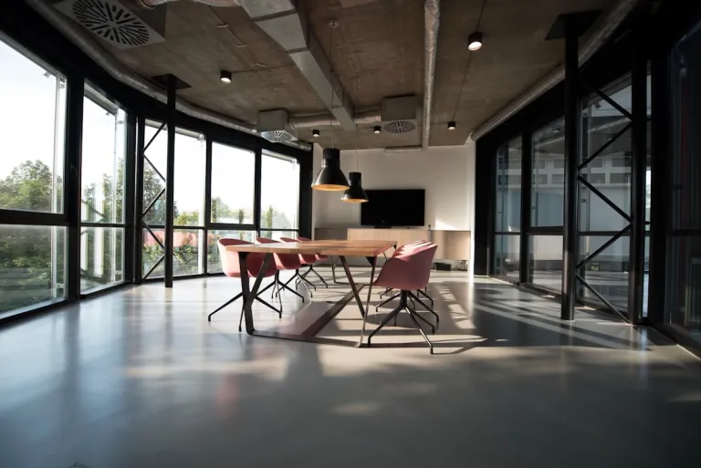 Modern office meeting room with floor-to-ceiling windows