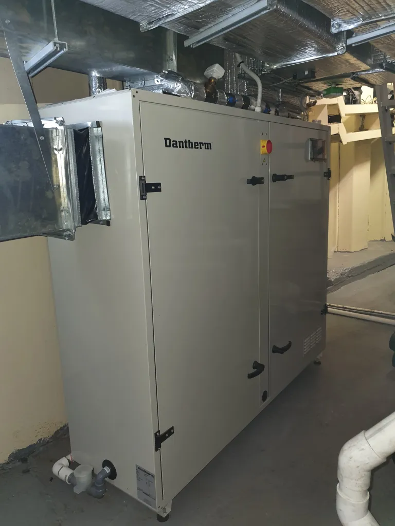 Dantherm pool dehumidifier installed in a plant room
