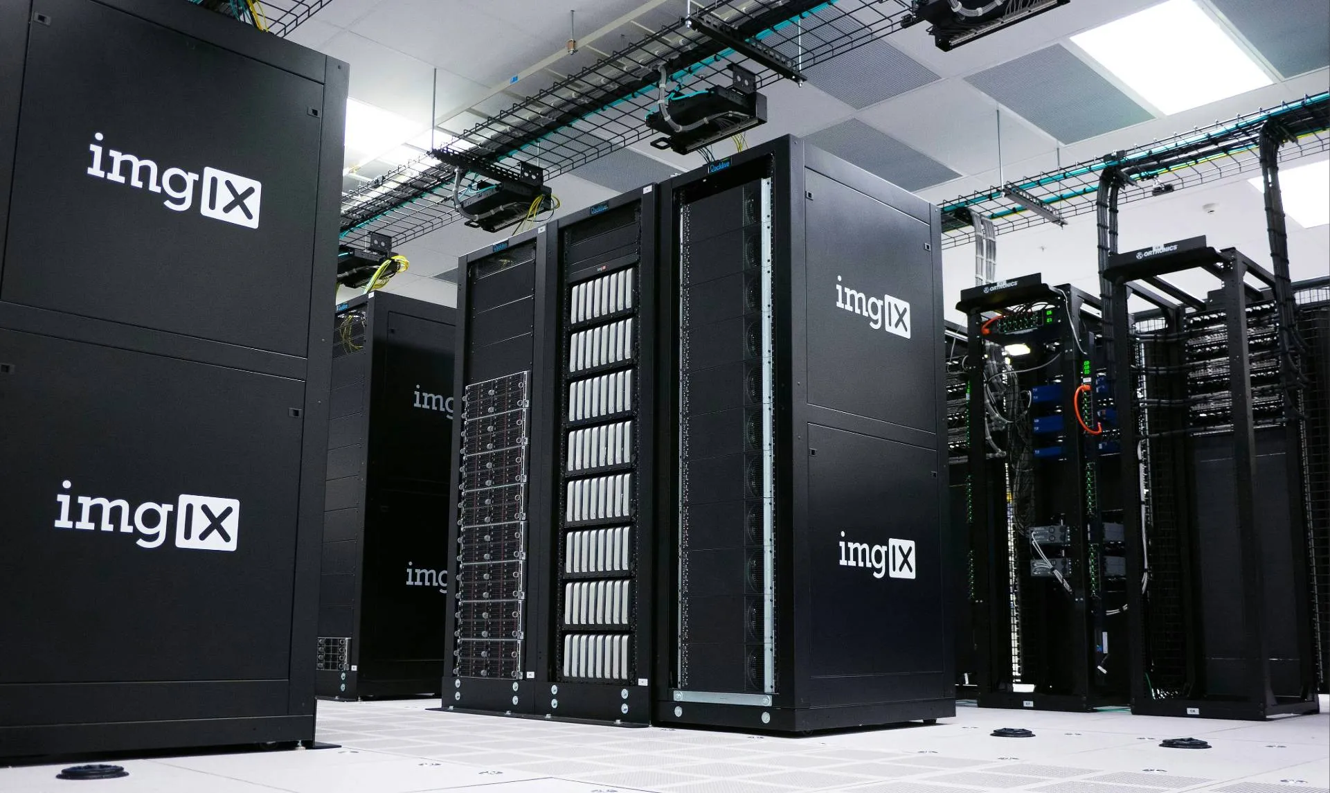 Row of black server racks in a data centre
